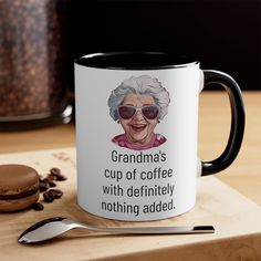 a coffee mug with an image of grandma's cup of coffee and a spoon