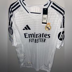 the jersey worn by real madrid is on display at the club's official store