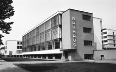 an old black and white photo of a building with the word bauchs on it