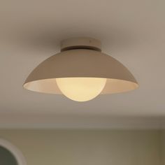 an overhead light fixture in a room