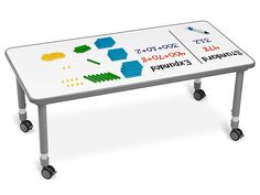 a white table with wheels and writing on the top is shown in front of a white background