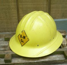 This industrial yellow fiberglass hard hat shows the honest wear, tear and marks of vintage industrial/construction gear. I'm NOT selling it as up-date-protection but as a costume, photo prop or decoration. It measures about 12 by 10-1/2 inches . Construction Worker Hat, Construction Gear, Industrial Construction, Construction Worker, Tools And Equipment, Vintage Industrial, Photo Prop, Vienna, Photo Props