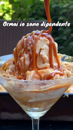 an ice cream sundae with caramel drizzle on top