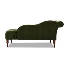 a green velvet chaise lounger with wooden legs and footrests on an isolated white background