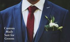 a man in a suit with a boutonniere on his lapel