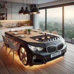 a modern kitchen with an electric stove and dining room table in the center, surrounded by large windows