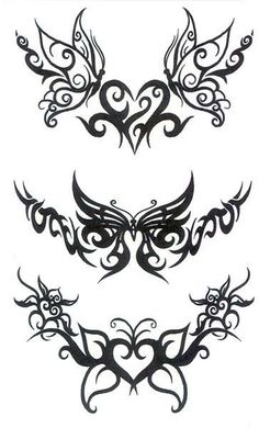 some tattoos that are on the side of their face and one is in the shape of a heart