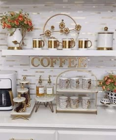 a coffee bar with cups, mugs and other items on the shelves above it