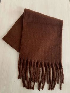 This luxurious solid-color scarf is made with the finest cashmere, draping elegantly and offering sumptuous warmth and comfort. DetailsPattern Type: SolidMaterial: CashmereScarves Type: Scarf, Shawl Thick Scarf, Christmas Wishlist, Scarf Shawl, Winter Scarf, Shawl, Cashmere, Solid Color, My Style, Quick Saves