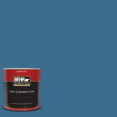 the behr paint is light blue and has a white base with green trim on it