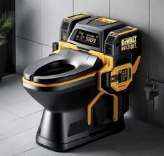 a black and yellow toilet sitting on top of a tiled floor