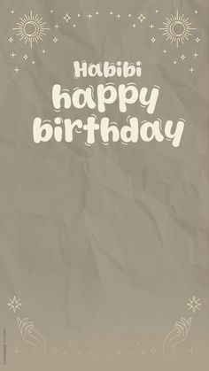 a birthday card with the words happy birthday written in white on a crumpled paper background