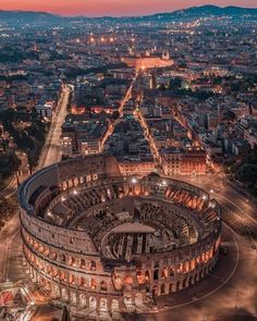 an aerial view of the roman colossion in rome, italy at night time