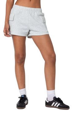 Soft cotton fleece adds cozy comfort to these relaxed shorts popped with on-trend cargo pockets for an ultracool look. Elastic waist Cargo flap-patch pockets 100% cotton Machine wash, dry flat Imported Leisure Shorts With Pockets, Sporty Shorts With Patch Pockets, Athleisure Shorts With Cargo Pockets, Leisure Bottoms With Pockets, Short Leisure Bottoms With Pockets, Cotton Cargo Pocket Athleisure Shorts, Cotton Cargo Shorts In Athleisure Style, Gray Cargo Pocket Shorts For Streetwear, Cotton Athleisure Shorts With Cargo Pockets