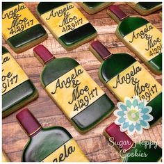 decorated cookies with wine bottles and names on them