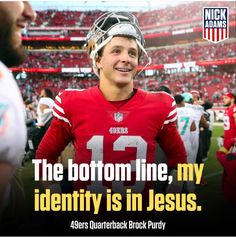 a man in a football uniform with the caption that reads, the bottom line, my identity is in jesus