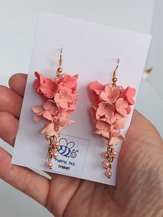 Cluster Flower Earrings Pink Polymer Clay Pink Flower Polymer Clay Earrings, Cheap Pink Clay Jewelry, Pink Polymer Clay Flower Earrings For Weddings, Handmade Peach Dangle Earrings, Pink 3d Flower Polymer Clay Earrings, Pink Polymer Clay Earrings With 3d Flowers, Polymer Clay Floral Earrings, Cruise Earrings, Polyclay Earrings