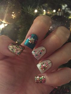 December emerald pink Christmas nails Bright Pink Christmas Nails, Christmas Accent Nail, Pink And Teal Christmas Nails, Christmas Confetti Nails, Teal Christmas Nails, Spearmint Christmas Nails, Christmas Tree Accent Nail, Pink December, Dot Christmas Tree Nails