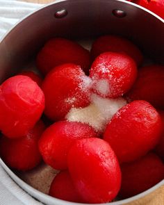 some red food is in a white bowl