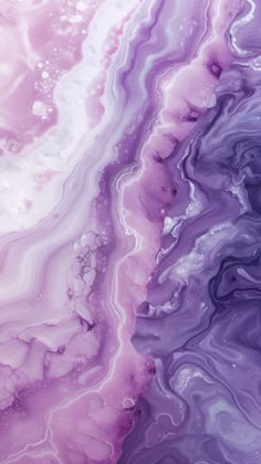 an abstract marble background with purple and white swirls on the top, as well as pink