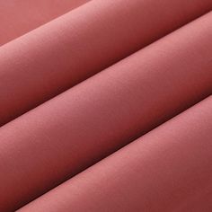 a close up shot of the fabric in pink color, it is very soft and smooth