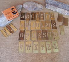 wooden letters and numbers laid out on a table