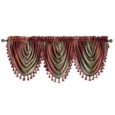 a curtain with tassels hanging from it's side