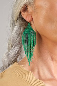 Inspired by bold jungle motifs, these bead curtain earrings feature vibrant leafy green colors. These eye-catching earrings are thoughtfully designed and carefully handmade right here in Boulder, Colorado, our beloved hometown. Hand Beaded Earrings, Bead Curtain, Hand Beaded Jewelry, Beaded Curtains, Green Beads, Boulder Colorado, Green Bead, Hand Beading, Beaded Earrings