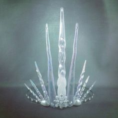 Its finally here! The ultimate Ice Queen crown! Made with beautiful iridescent acrylic icicles, this tiara comes in at a staggering 16cm in height Queen Tiara, Queens Tiaras, Mermaid Crown, Diy Crown, Tiara Crown