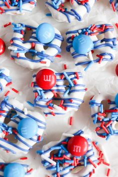 red, white and blue decorated donuts with candy