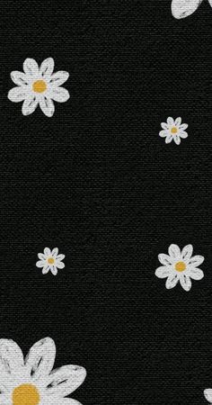 white daisies and black background with yellow centers on the center part of the fabric