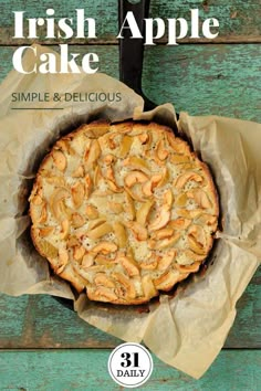 the cover of irish apple cake is shown on a wooden table with a knife in it