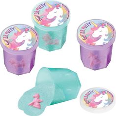 four plastic containers with unicorns on them