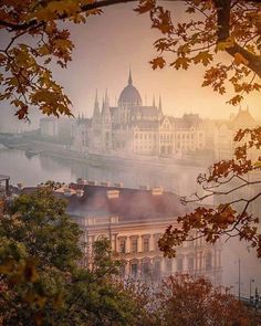 an image of a city that looks like it is in the middle of foggy weather