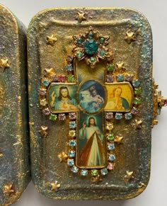 the cross is decorated with pictures of jesus and mary on it's back side