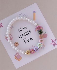 Celebrate your favorite teacher with this adorable personalized bracelet they will love forever!! Average adult wrist size is 7".  All items are handmade in the USA! Bracelet For Teacher, Era Bracelet, Neon Cactus, Teacher Bracelet, My Teacher, Favorite Teacher, Personalized Bracelet, Teacher Name, Love Forever