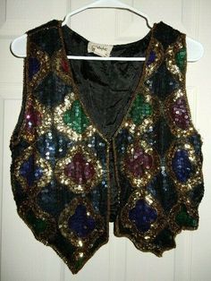 Style Design Sequin Vest, L, 100% Silk, Rayon Lining. I found this is a storage unit there is a slight scent of perfume.