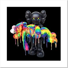 a black teddy bear with multicolored paint dripping on it