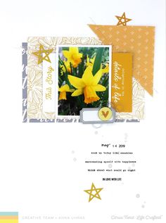 a scrapbook page with yellow flowers and stars