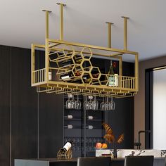 a wine rack hanging from the ceiling over a dining room table with black leather chairs