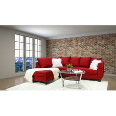 a living room with red couches and white rugs