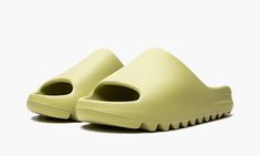 The adidas Yeezy Slide “Resin 2022” is the September 2022 release of Kanye West’s slip-on shoe in a neutral earth tone colorway.  The Yeezy Slide has been released in several “Resin” colorways over the past few years to meet the demand and popularity of the look.  The September 2022 version is darker in hue than the 2021 release, and more brownish-tan than the original green look from 2020.  As lightweight and effortlessly versatile as ever, the “Resin” is constructed from soft EVA foam for all- 70s Converse, Adidas Campus 80s, Kanye West Style, Adidas Yeezy Slide, Casual Slides, Nike X Travis Scott, Ugg Ultra Mini, Fall Sneakers, Converse Run Star Hike