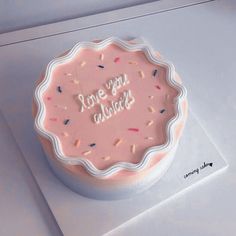 there is a cake that says love you always on it