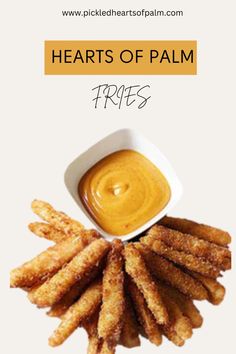 fries with dipping sauce on top and the words, hearts of palm fries written below