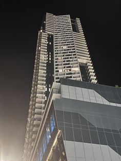 a very tall building that is lit up at night