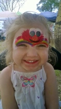 Elmo rainbow face paint Sesame Street Face Paint, Elmo Face Paint, Elmo Face, Rainbow Inspiration, Rainbow Face Paint, Seaseme Street, Elmo Birthday Party, Rainbow Face