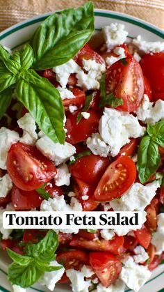 tomato feta salad with basil leaves on top