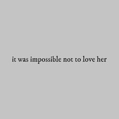 the words it was impossible not to love her in black on a gray background,