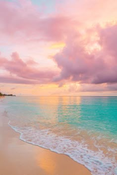 the beach is clean and ready to be used as a backdrop for this beautiful sunset