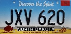 a license plate with the words jxv 6620 north dakota written on it